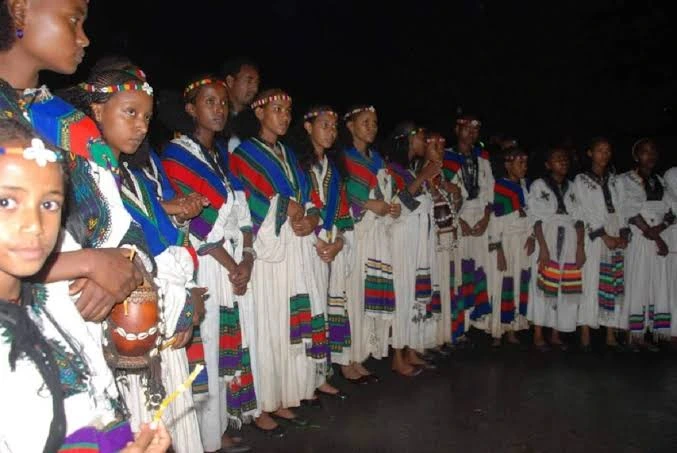 Girls in traditional dress lined up for the Ashenda festival celebration in Tigray, Ethiopia