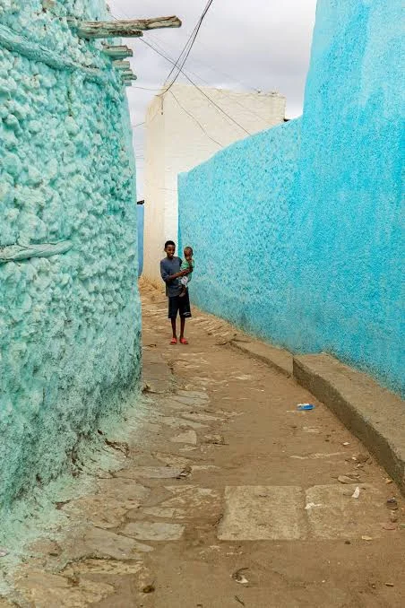 A narrow blue-painted alley in the walled city of Harar, Ethiopia