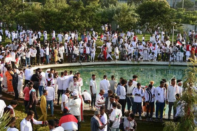 Oromo worshippers in traditional attire celebrating Irreecha at a gathering in Addis Ababa, Ethiopia