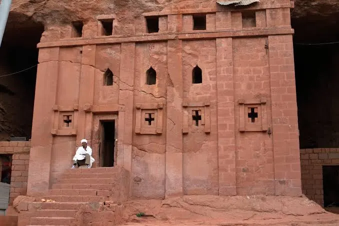 Aerial view of a rock-hewn church and pilgrims in Lalibela, Ethiopia