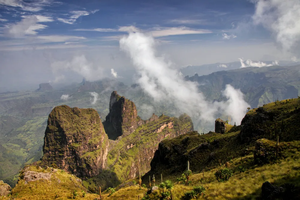 Dramatic escarpment pinnacles rising through the clouds in the Simien Mountains, Ethiopia