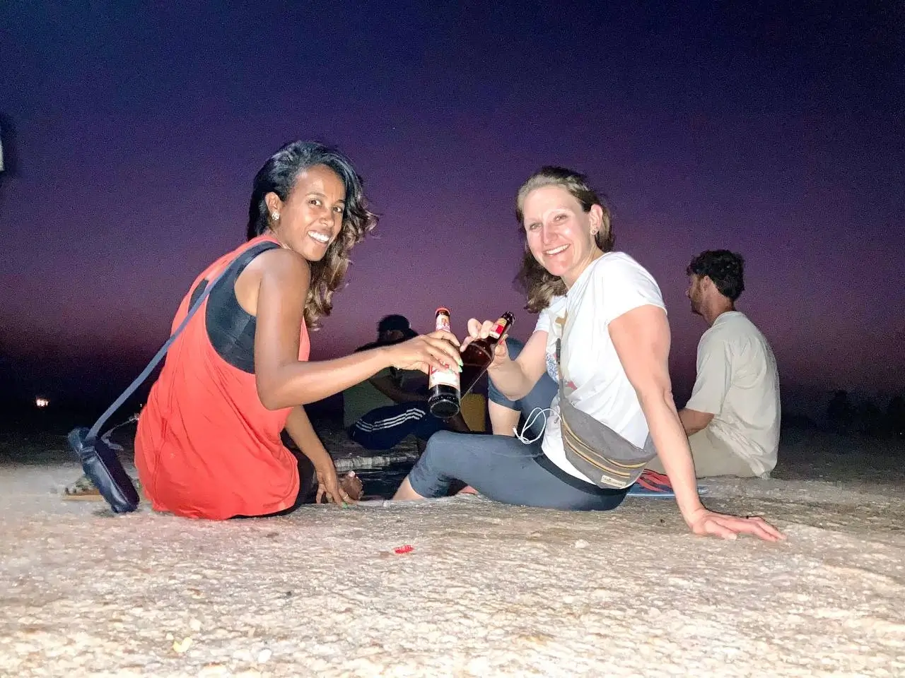 Nigisti Solomon celebrating with a traveler, marking the founding of Africa Tour Guide