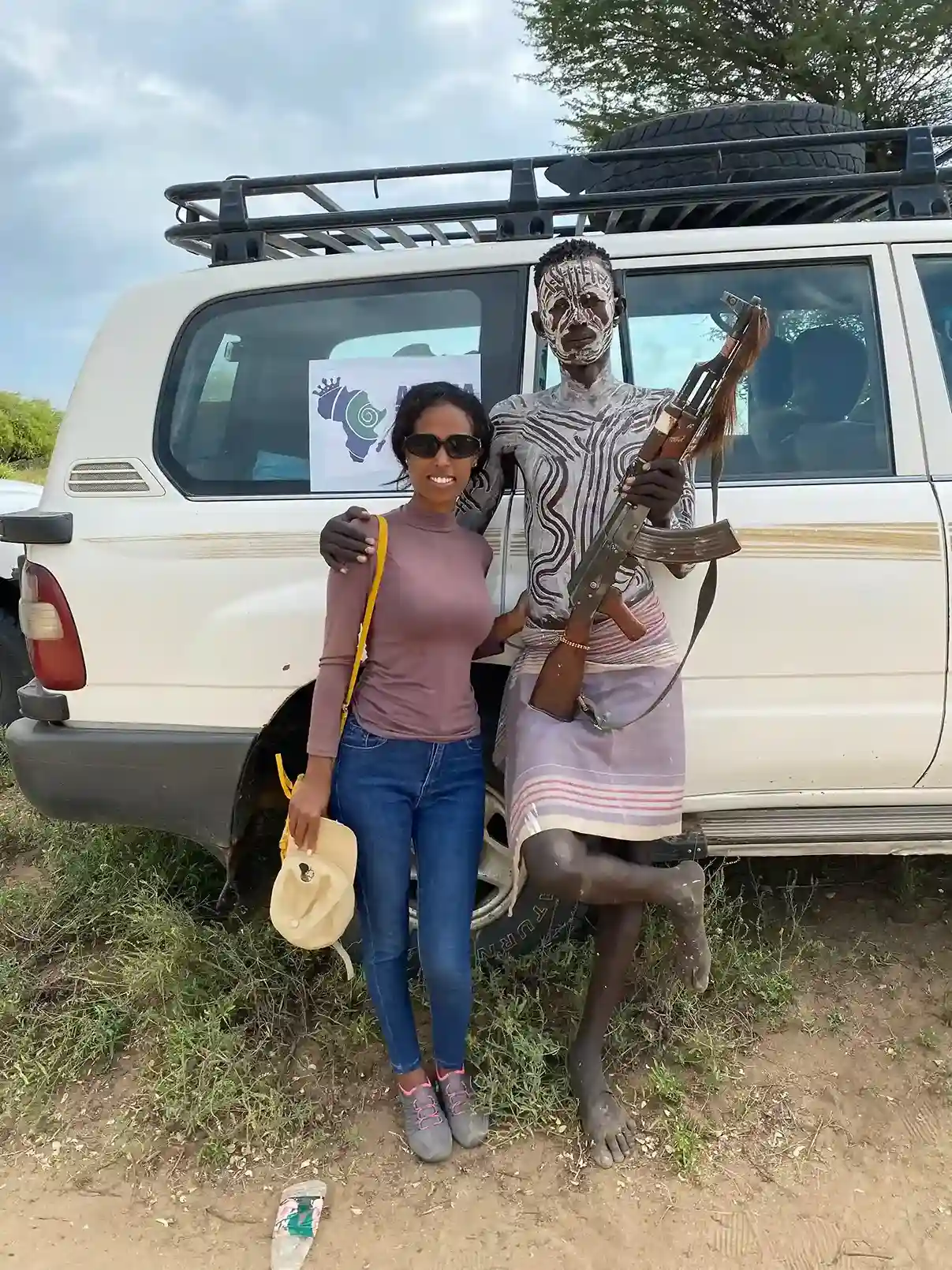 Nigisti Solomon with a tribal guide during an Omo Valley cultural tour, Southern Ethiopia